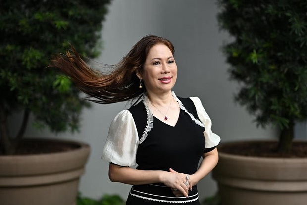  ​In 2024, while recovering from knee operations, Ms Evelyn Ng began losing clumps of hair. However, her hair has regrown after receiving treatment at Singapore General Hospital.ST PHOTO LIM YAOHUI 