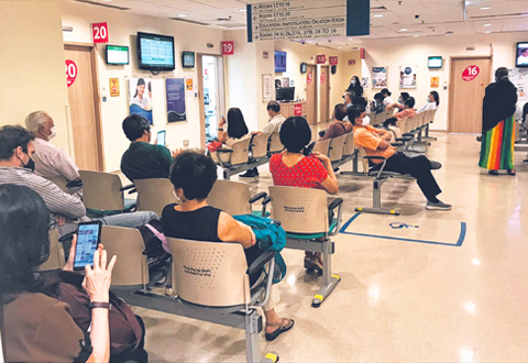  ​An outpatient clinic at the Singapore National Eye Centre. Waiting times there can stretch to 45 minutes on busy days. PHOTO SINGAPORE NATIONAL EYE CENTRE