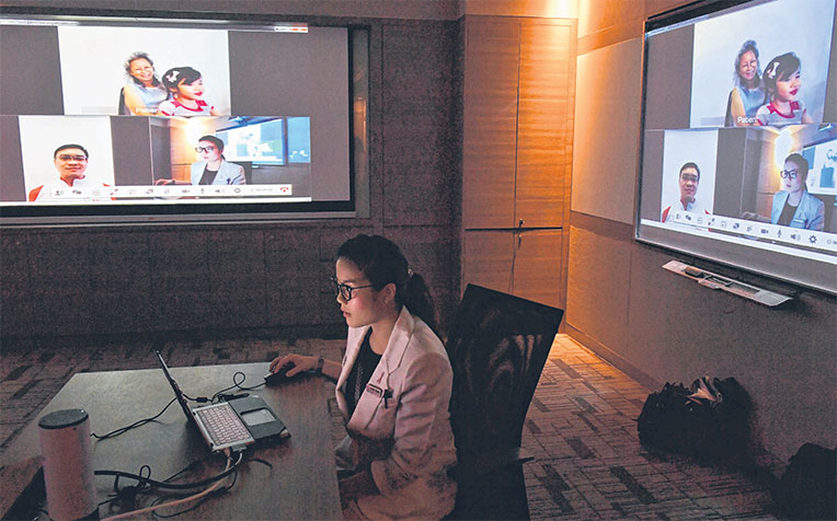  ​conducting a video consultation with a mock patient at home with her caregiver and the patient’s “father” yesterday.