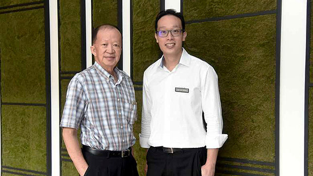  ​Before his operation, Mr Tiang (left) could not walk without wincing in pain. But the new method of surgery performed by Dr Pang (right) has improved his mobility radically.   ST PHOTO DON CHI